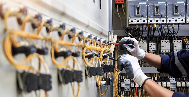 Professional Electrician technician working in Osage, IA